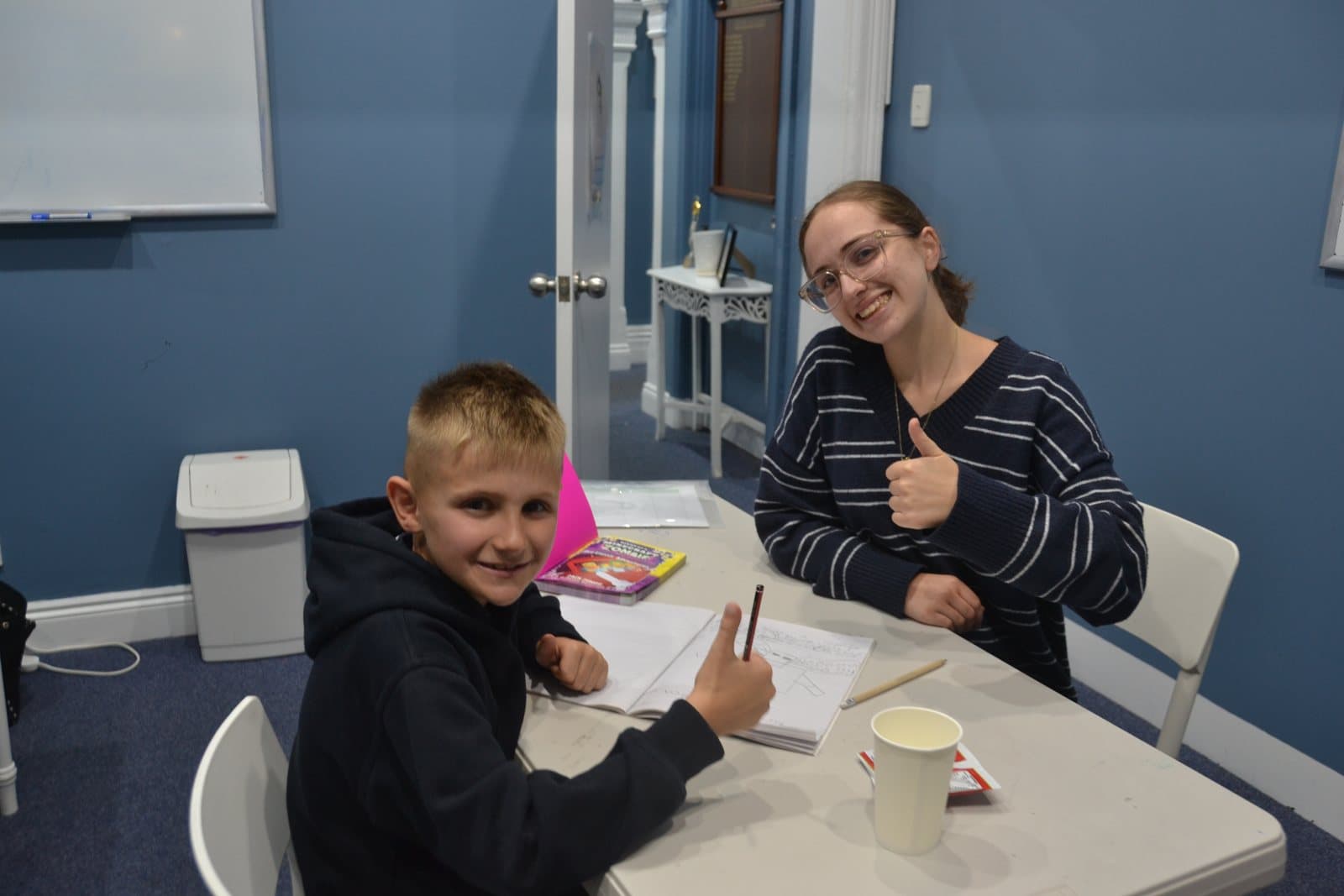 Tutor and students at a First Education centre