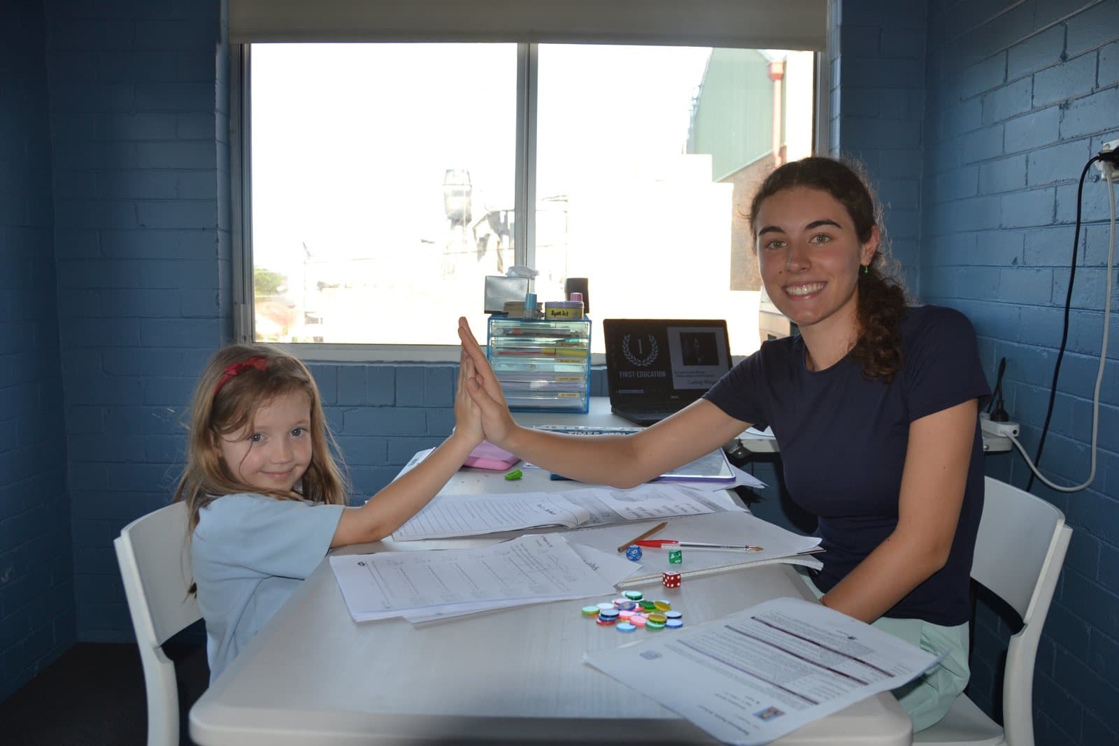Tutors and Kindergarten students at a First Education centre