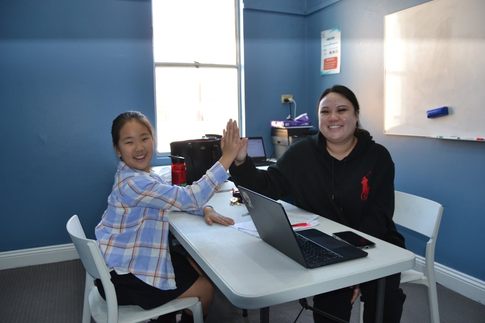 Tutors and Kindergarten students at a First Education centre