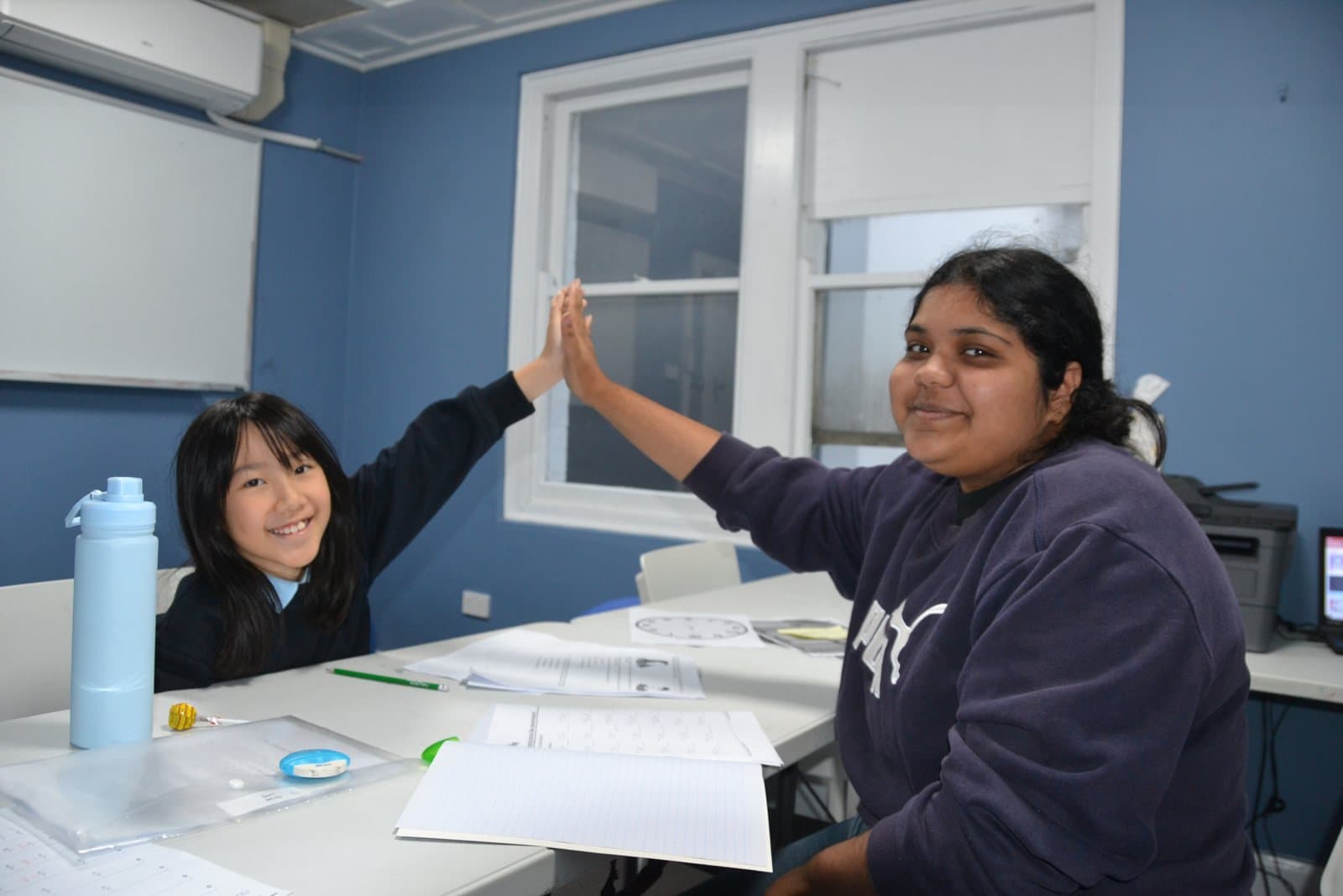Tutors and Year 1 students at a First Education centre