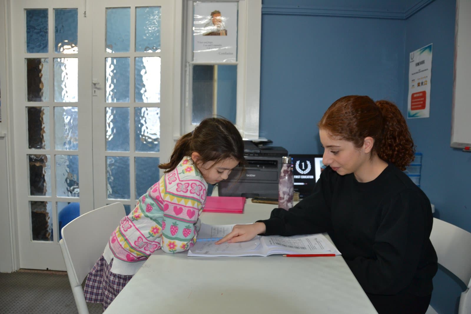 Tutors and Year 1 students at a First Education centre