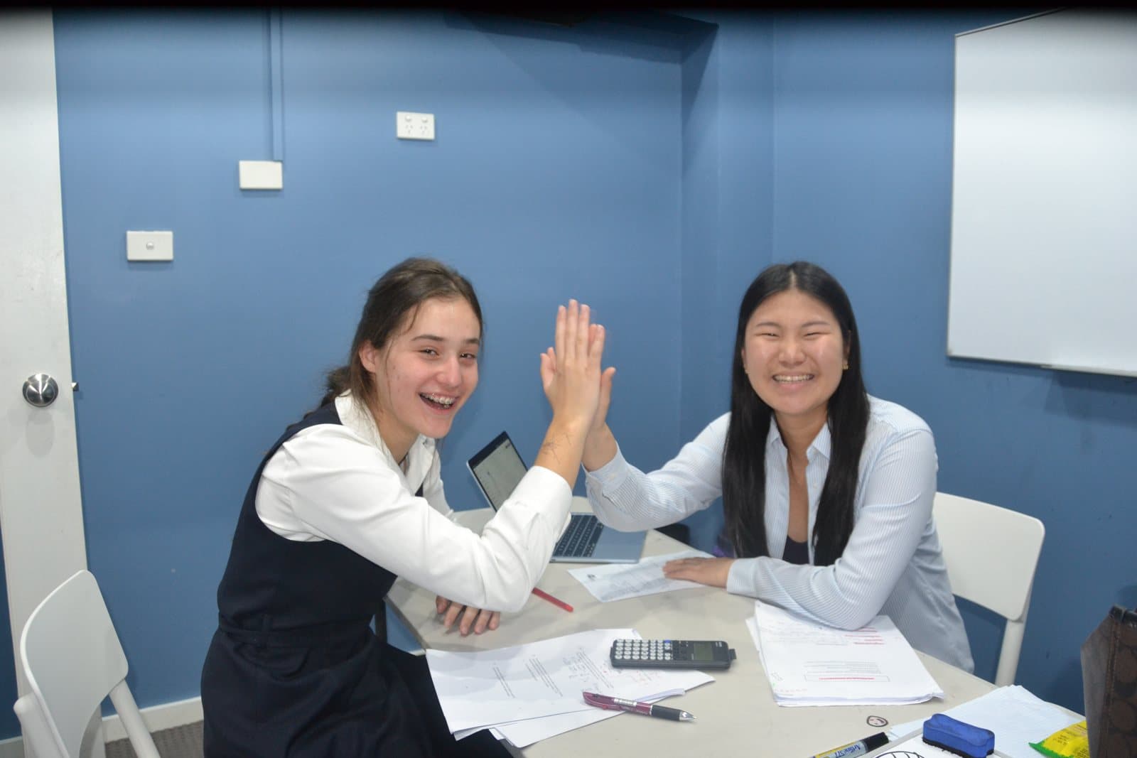 Tutors and Year 11 students at a First Education centre
