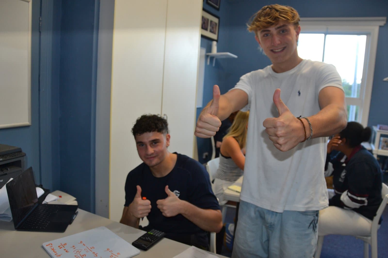 Tutors and Year 11 students at a First Education centre