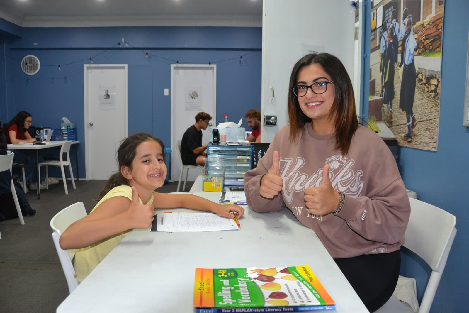 Tutors and Year 2 students at a First Education centre