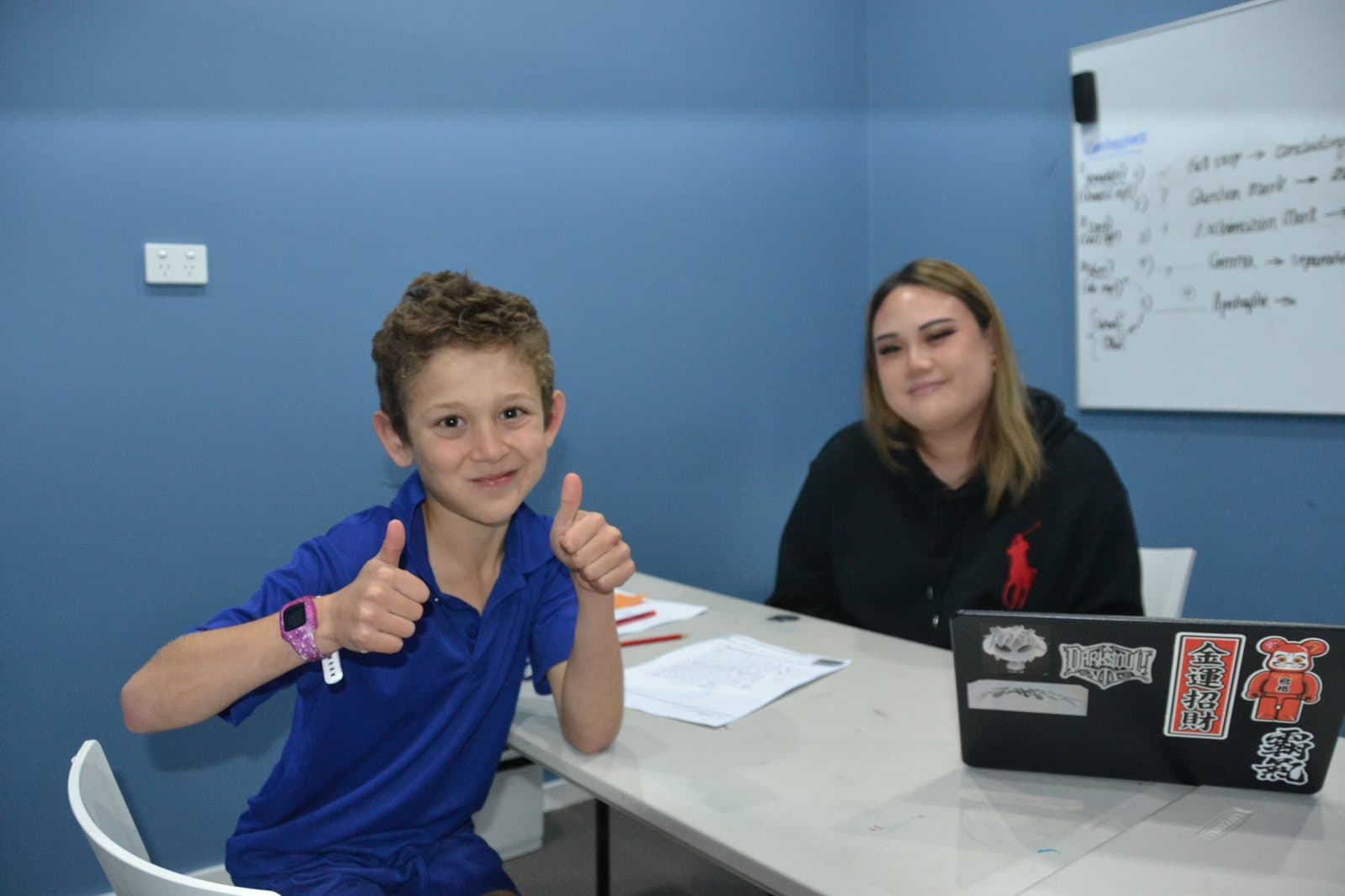 Tutors and Year 2 students at a First Education centre