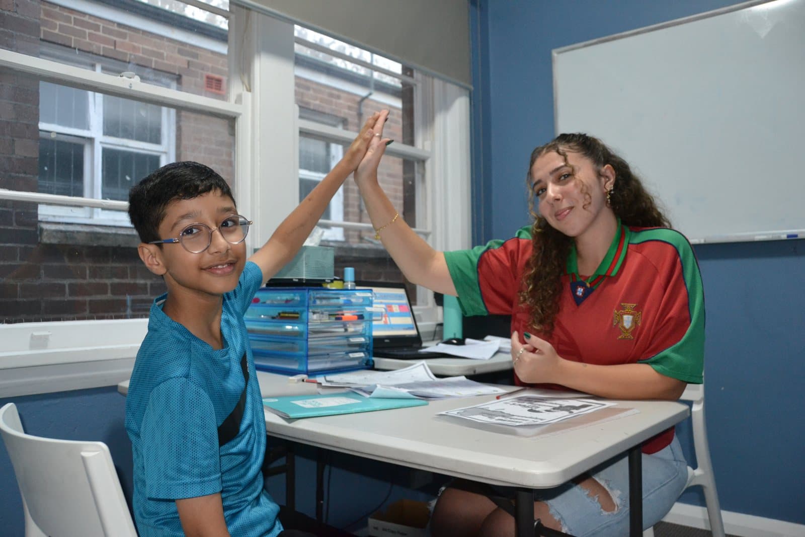 Tutors and Year 2 students at a First Education centre