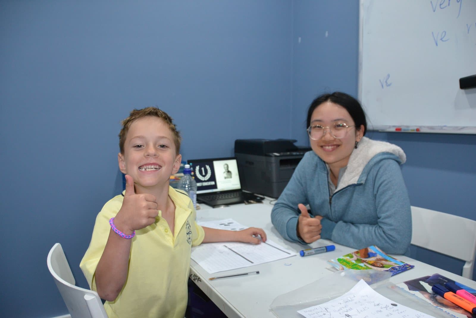Tutors and Year 2 students at a First Education centre