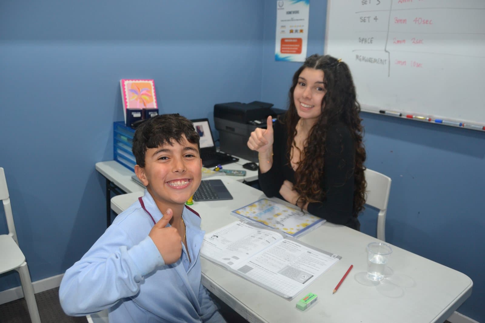 Tutors and Year 4 students at a First Education centre