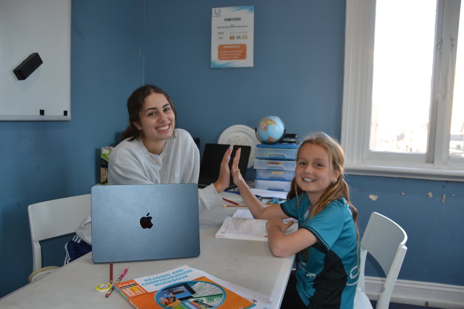 Tutors and Year 4 students at a First Education centre