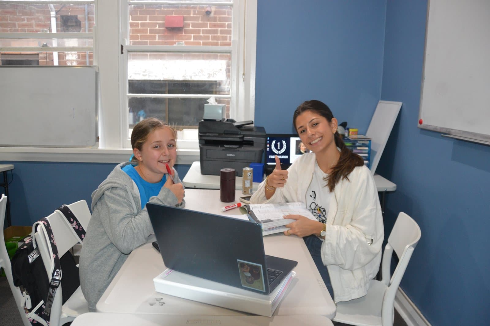 Tutors and Year 4 students at a First Education centre