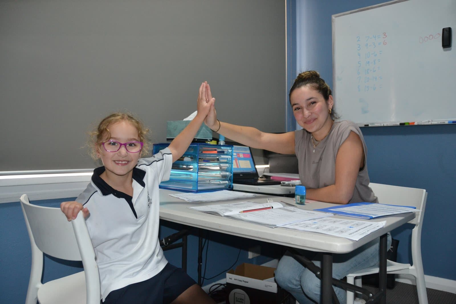 Tutors and Year 4 students at a First Education centre