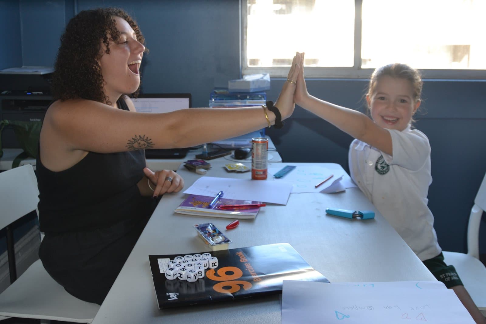 Tutors and Year 4 students at a First Education centre