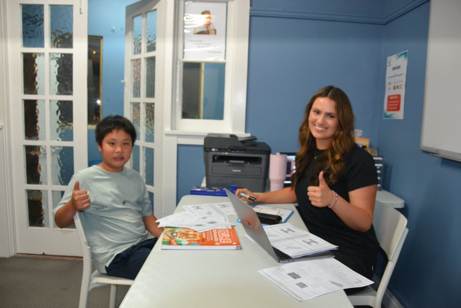 Tutors and students at a First Education centre