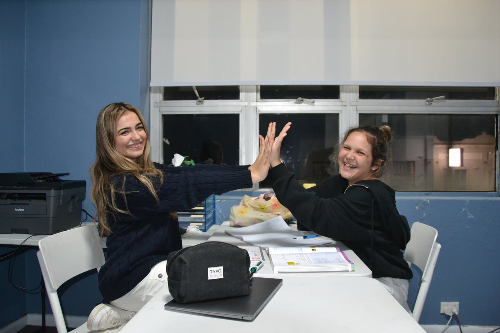Tutors and students at a First Education centre