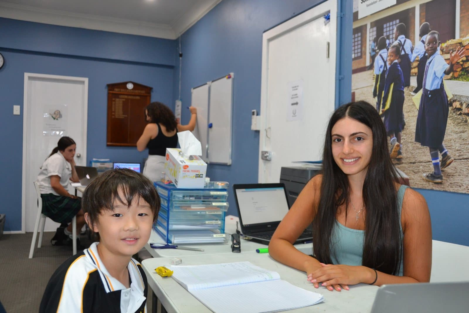 Tutors and students at a First Education centre