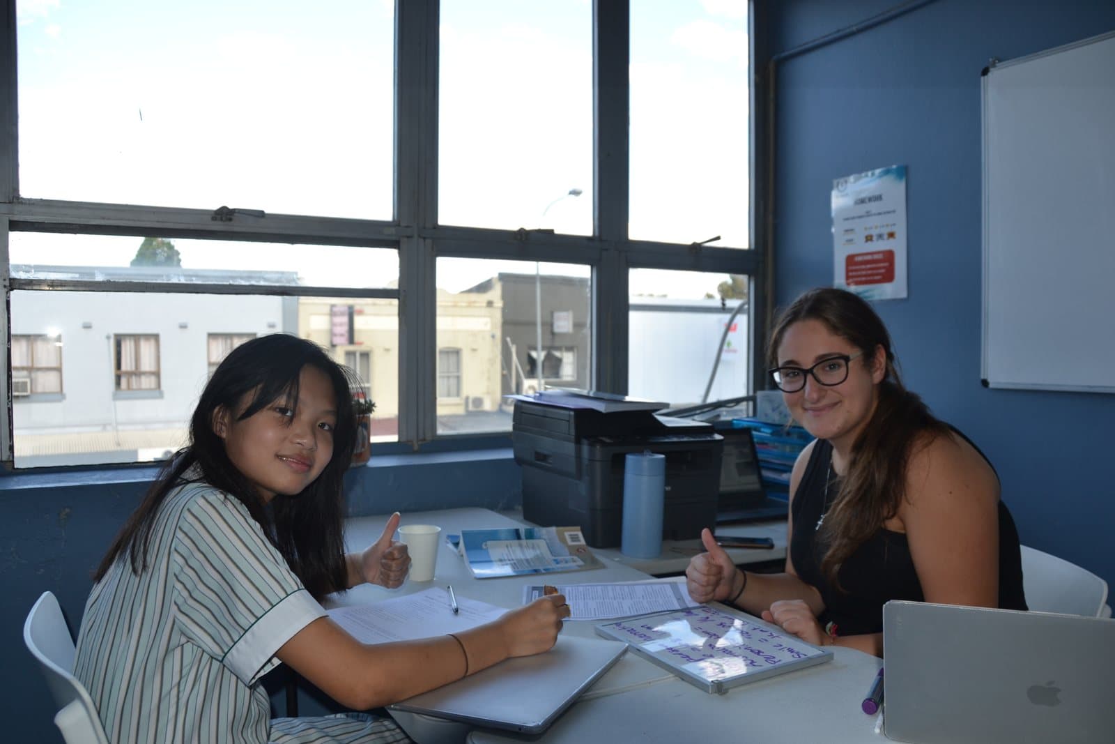 Tutors and students at a First Education centre