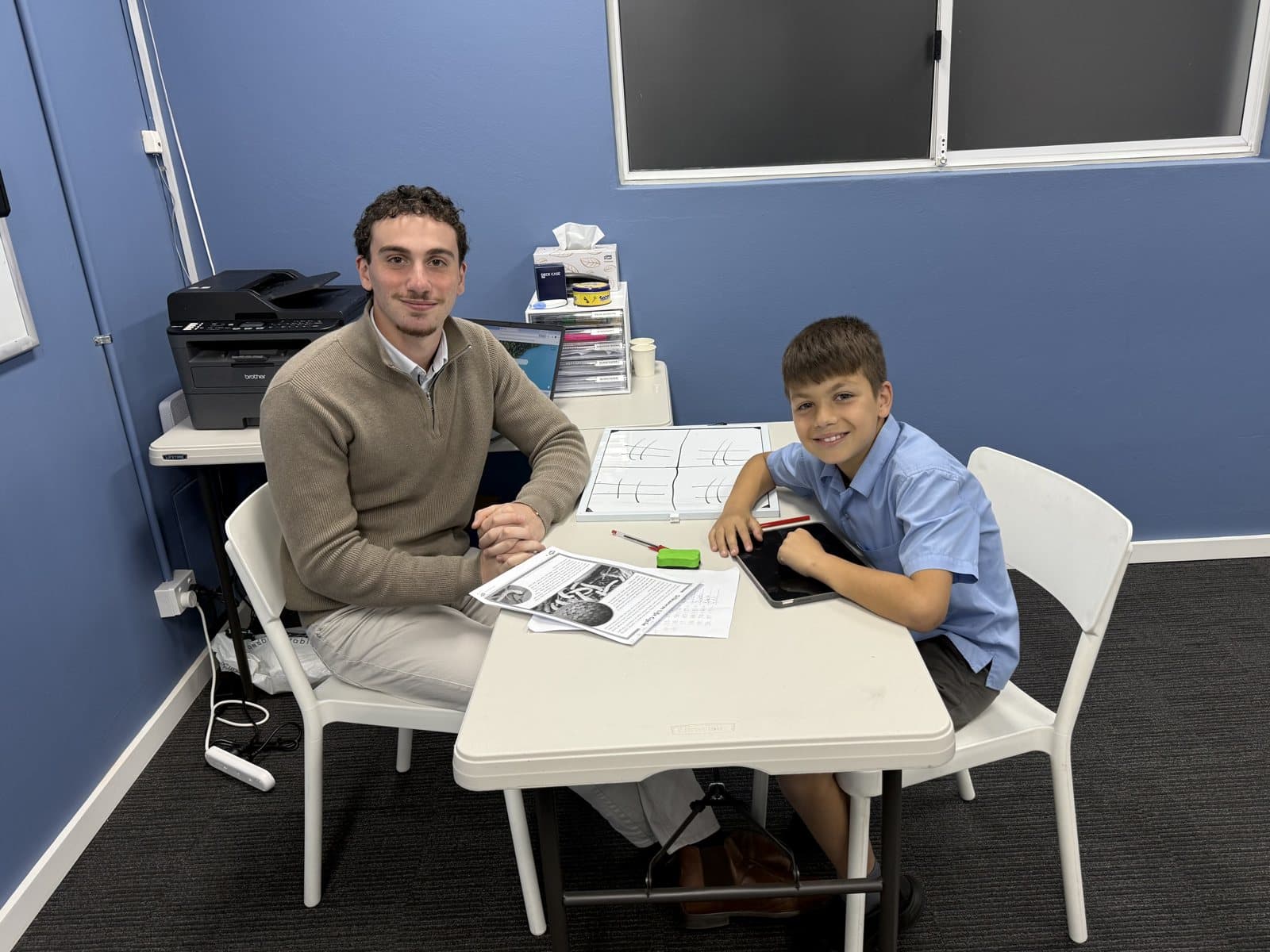 Tutors and students at a First Education centre