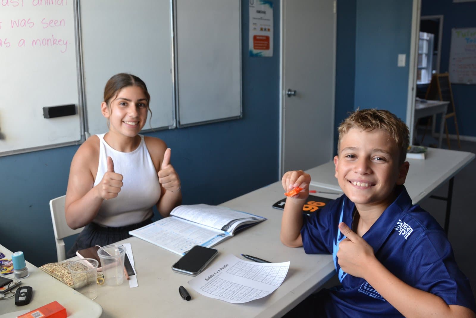 Tutors and students at a First Education centre