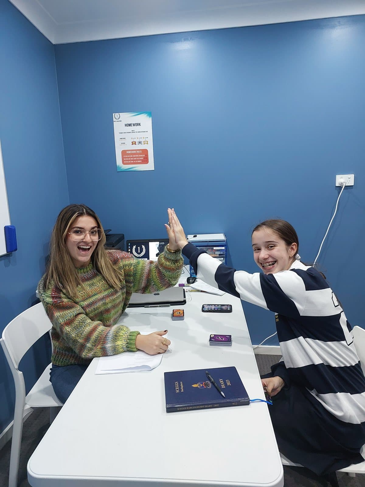 Tutors and students at a First Education centre