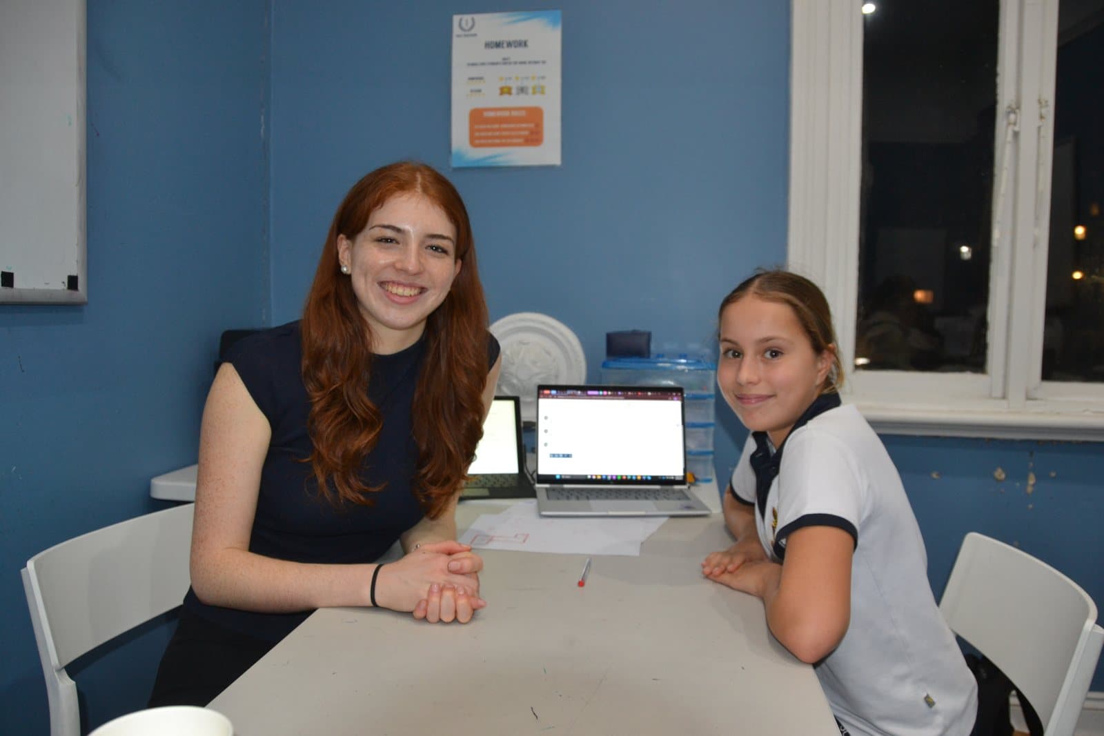 Tutors and students at a First Education centre