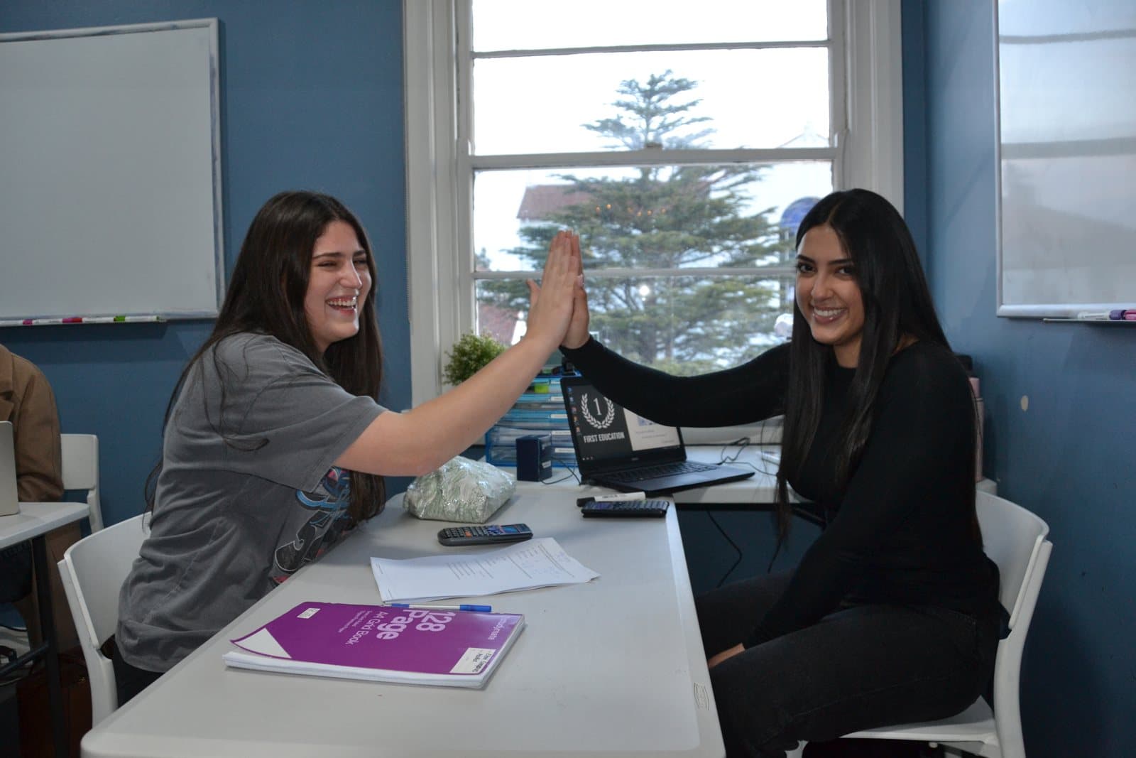 Tutors and Year 12 students at a First Education centre