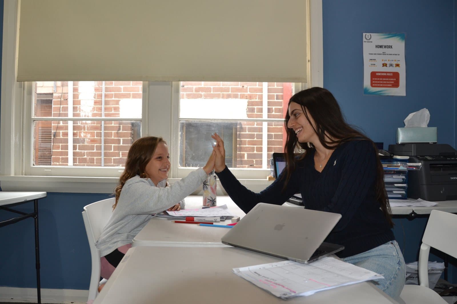 Tutors and Year 3 students at a First Education centre