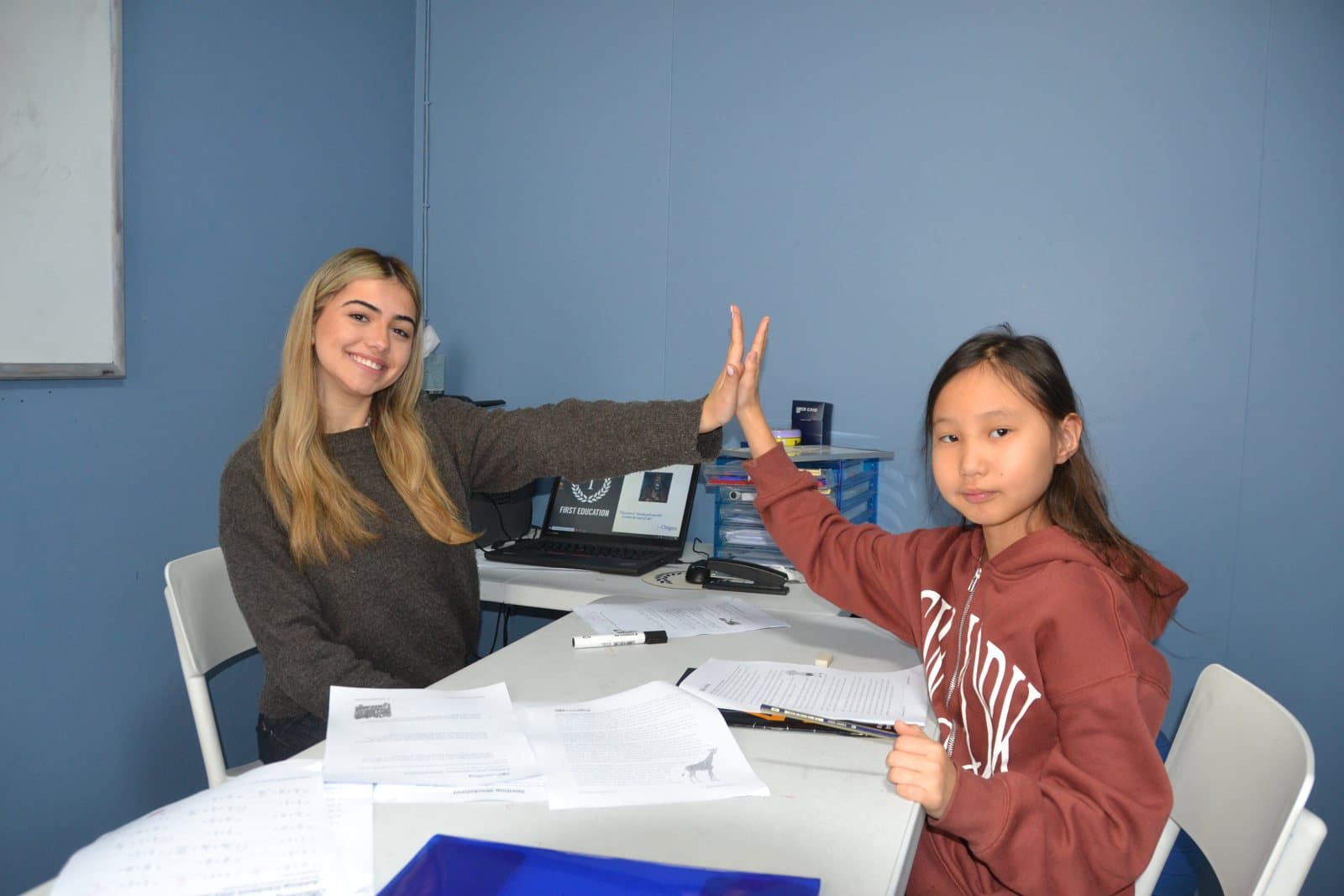 Tutors and Year 5 students at a First Education centre