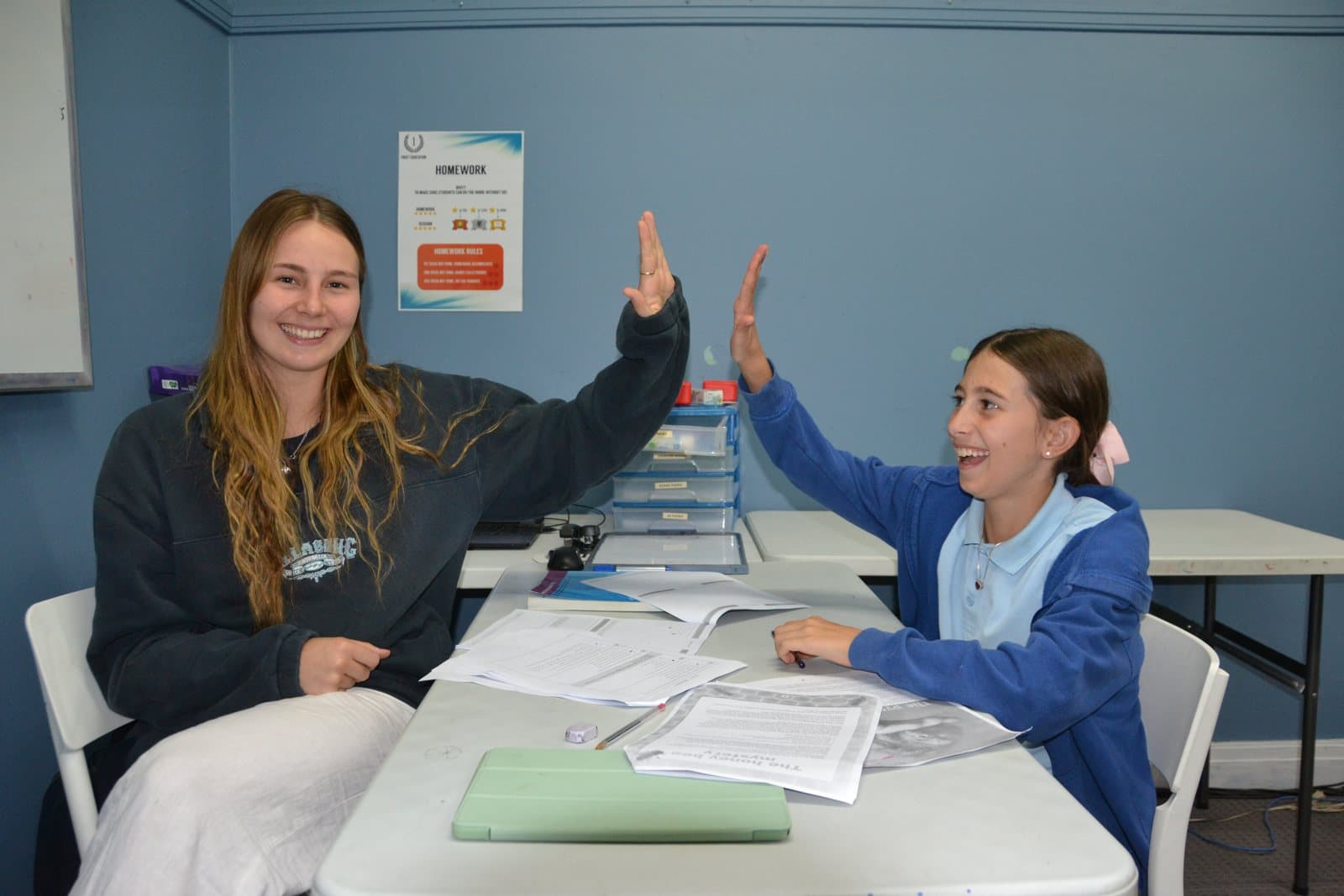 Tutors and Year 5 students at a First Education centre