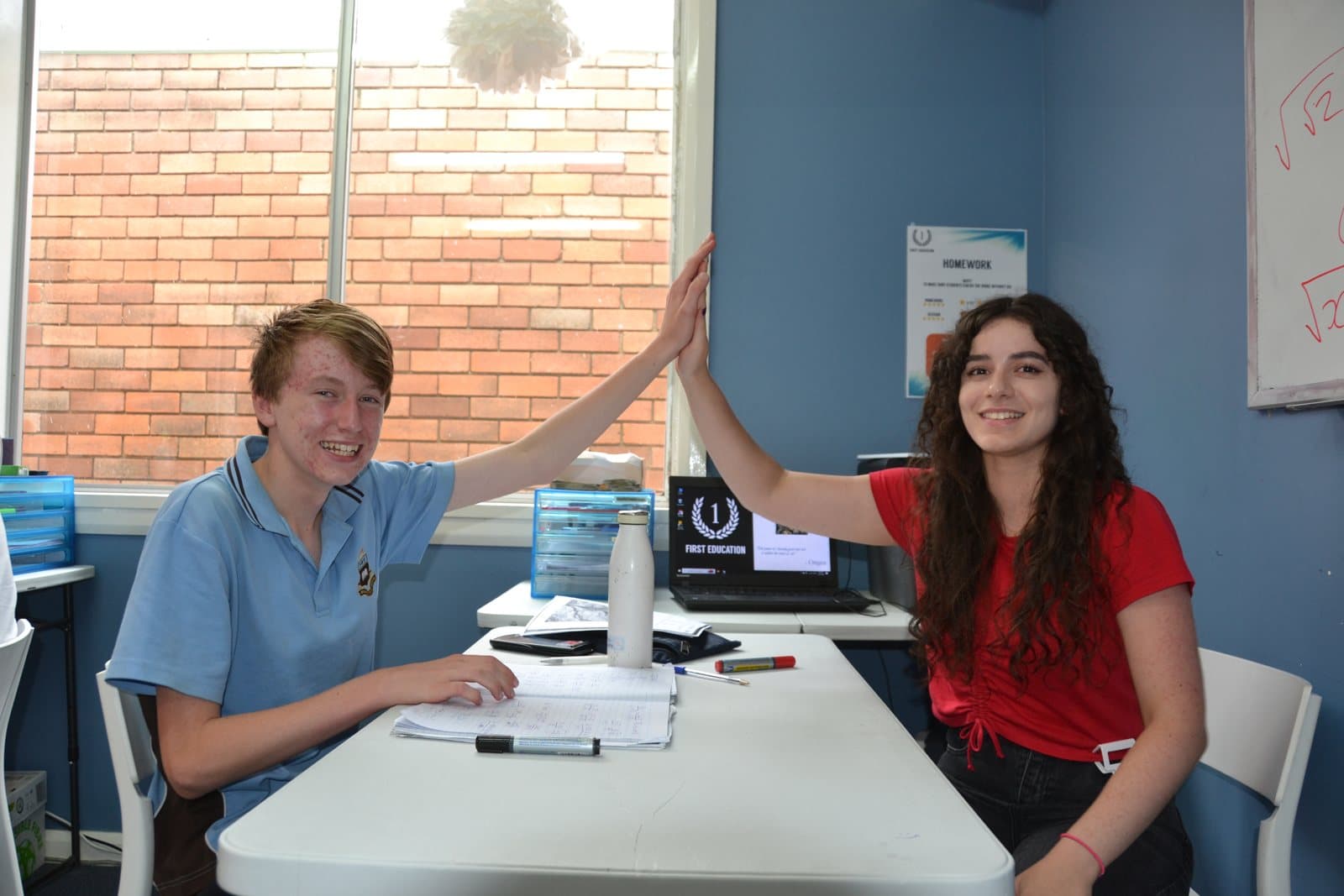 Tutors and Year 8 students at a First Education centre