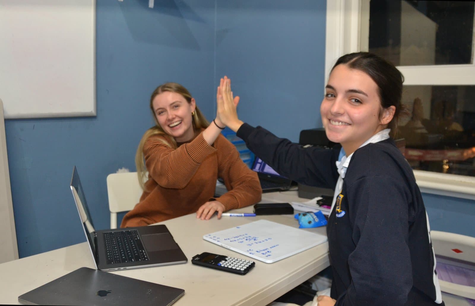 Tutors and Year 8 students at a First Education centre